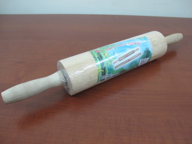 51b9ab2f0e0255c02876dc8b3caf7a47.jpg Large wooden rolling pin with rotating axes